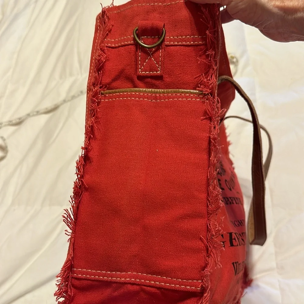 A La Fontaine Des Parfums Red & Black Fringe Tote. Shoulder & Crossbody Straps